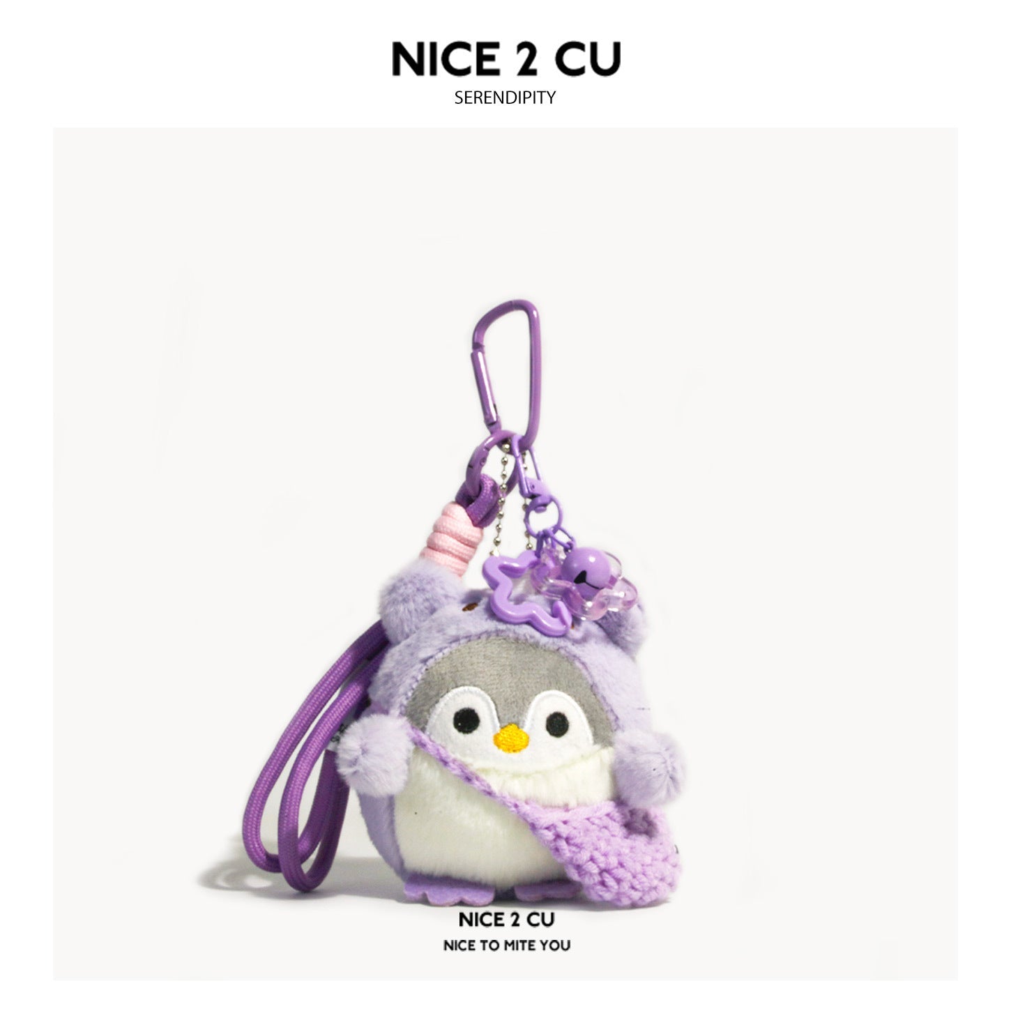 Purple kawaii penguin plush bag charm with lavender knitted wrap and purple star accent