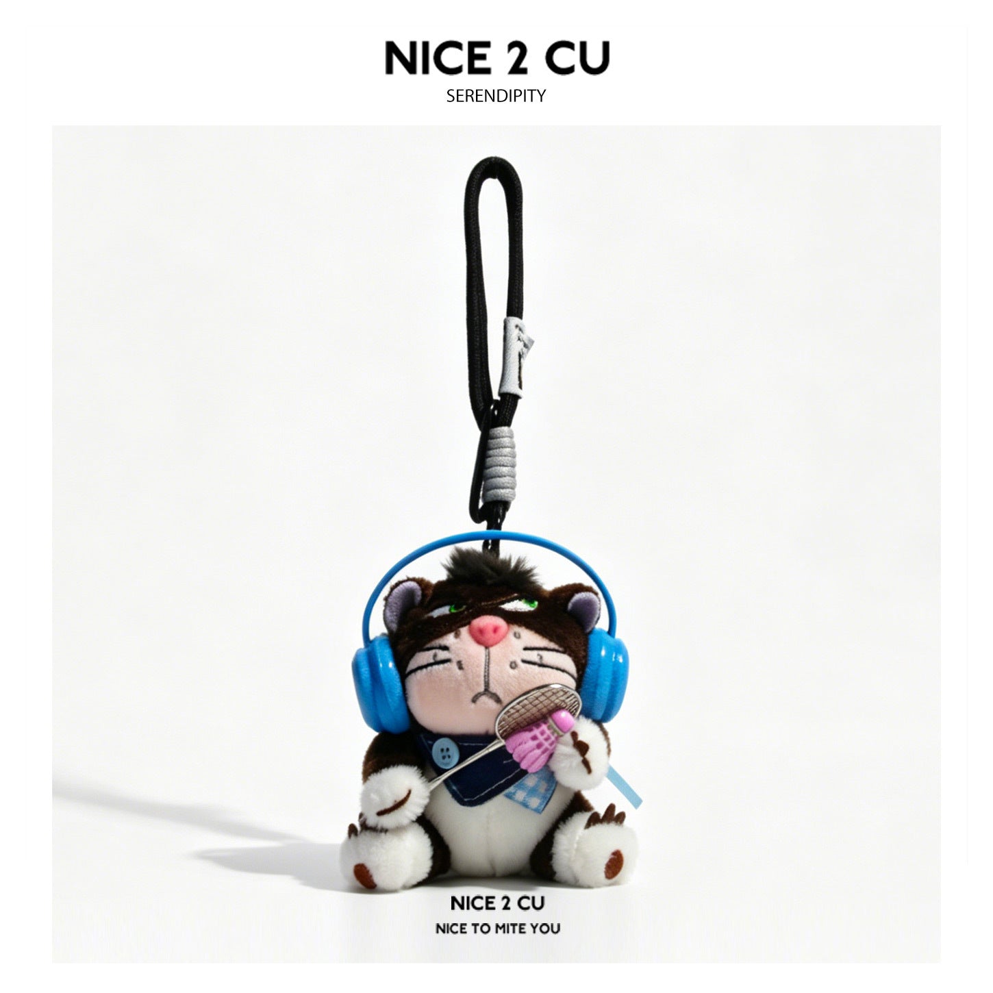 Brown cat plush charm wearing blue headphones and holding a tennis racket with a green ball