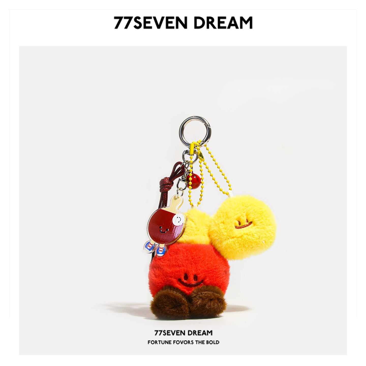 Ping-pong plush keychain pendant with red figure and yellow fuzzy ball charm on miu-style bead chain in red and yellow