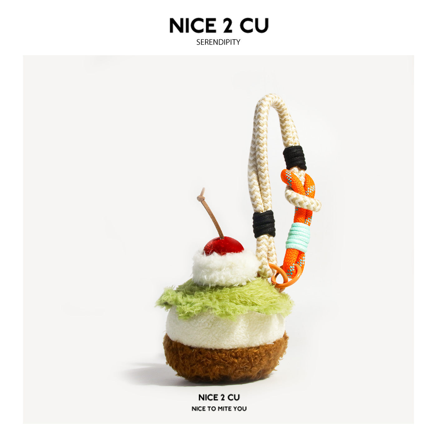 Matcha cupcake plush bag charm with green top, brown base, cherry topper, and cream-orange rope loop