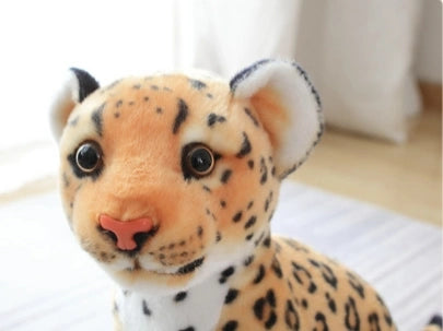 The ZoDoll Cheetah Plush Animal Stuffed Toy, available in 23cm, 27cm, and 33cm sizes, features realistic spotted fur, big eyes, and a pink nose—ideal for any animal plush collection and perfect for indoor display.