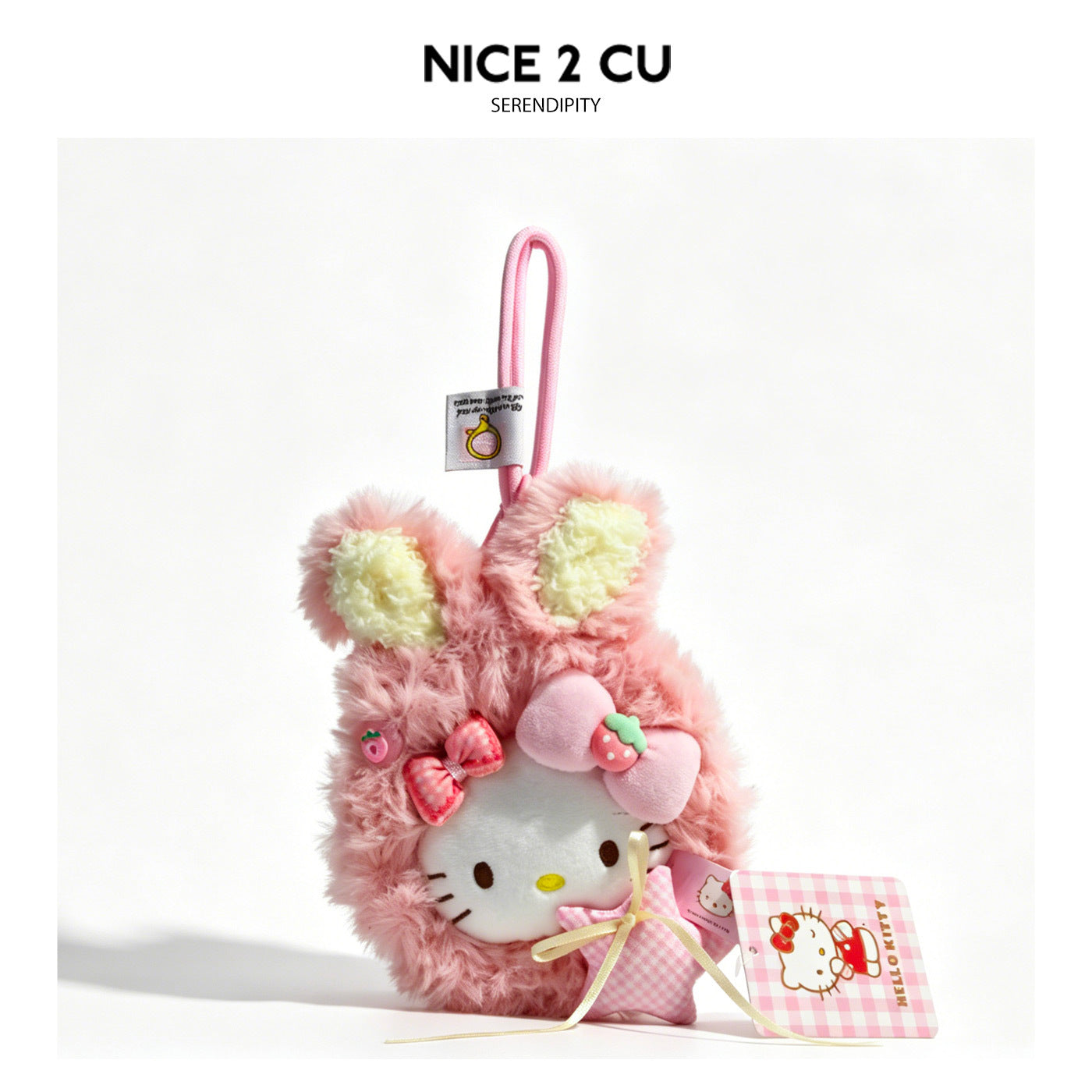 Pink bunny-ear plush cat-face charm with cream inner ears, pink bow, and decorative hang tag — Peach Bunny variant