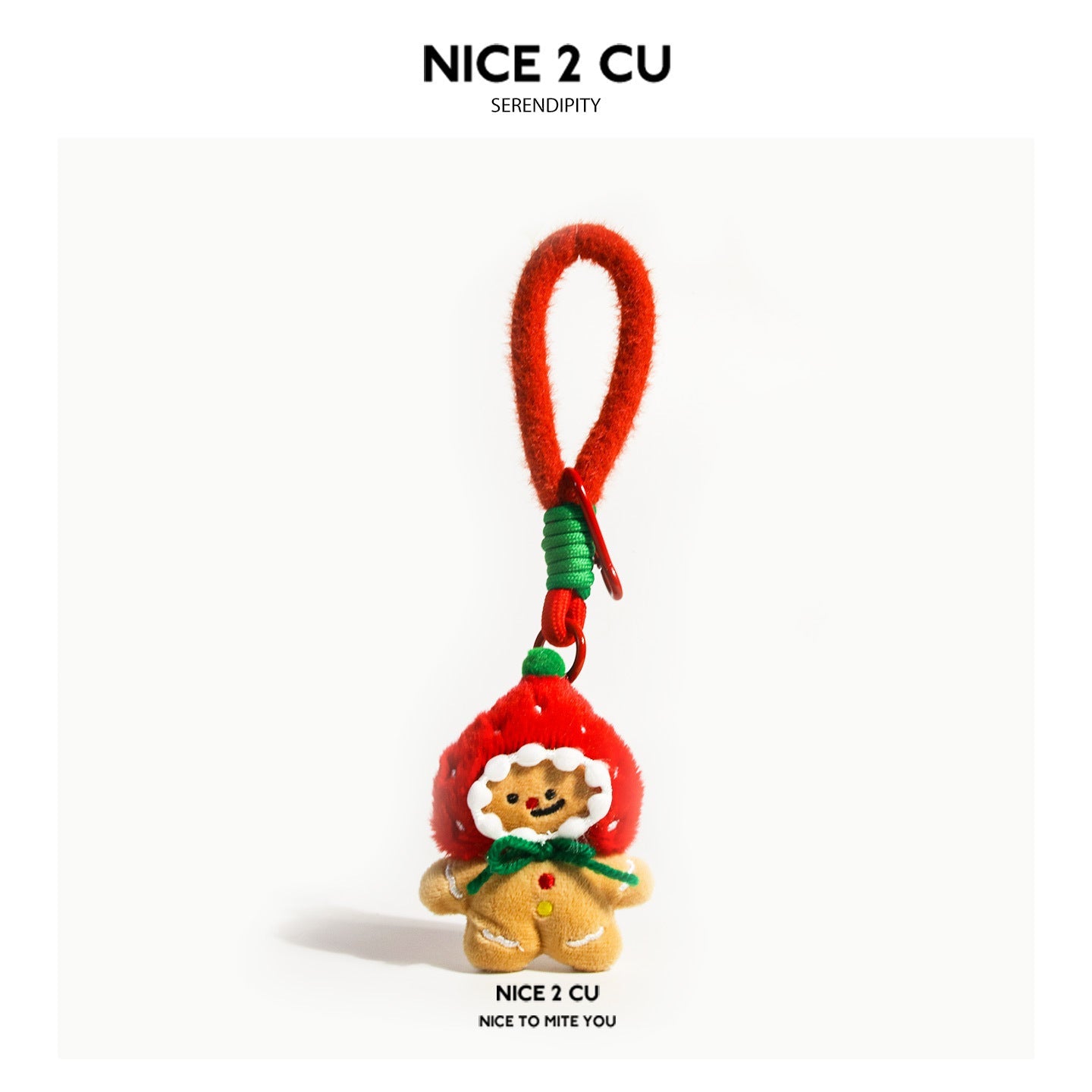 Strawberry gingerbread person plush charm with tan body, red hood, and white frosting trim on a red loop