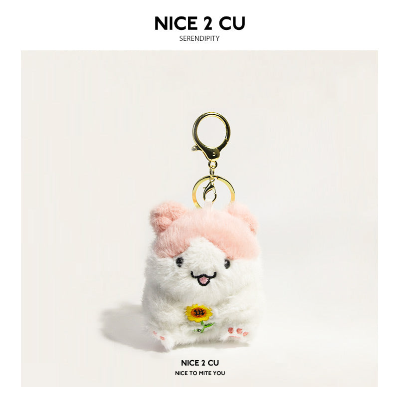 Pink-hat kawaii plush hamster keychain charm with embroidered sunflower and gold split-ring attachment