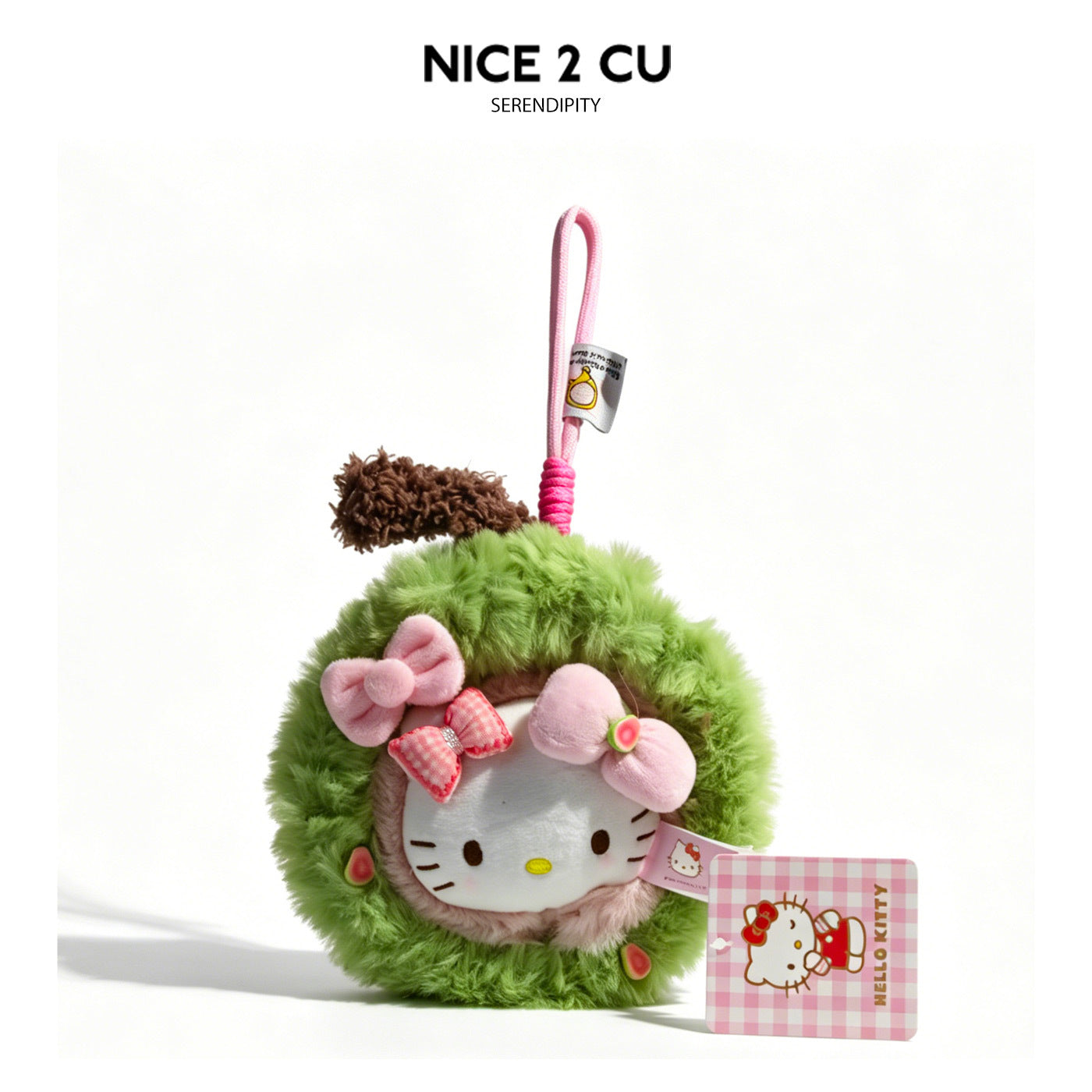 Round green plush cat-face charm with pink bow accents and decorative hang tag — Sweet Guava variant