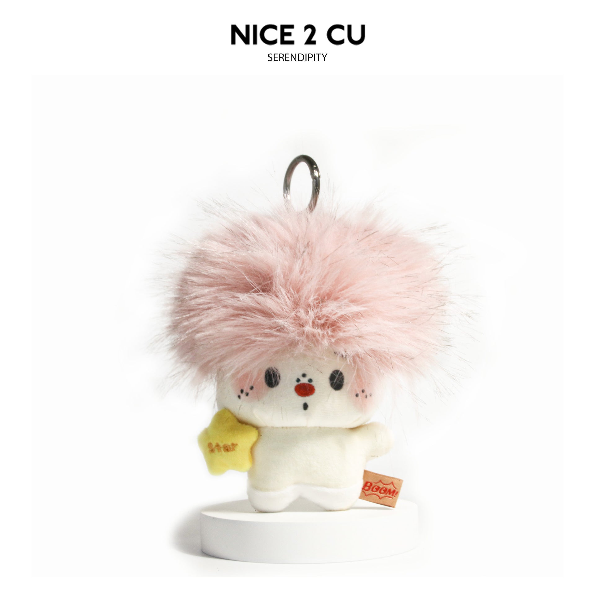 Pink fluffy afro plush charm pendant with BOOM! patch and yellow star accessory on split-ring clip