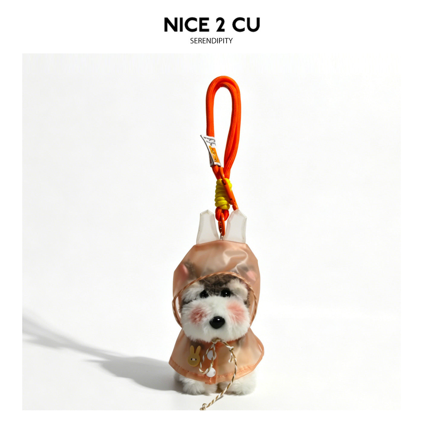 Schnauzer plush charm in a pink hooded raincoat with front tie cord and orange braided lanyard attachment