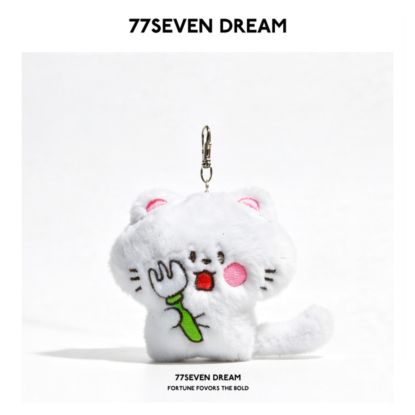 White kawaii cat plush keychain charm holding a green-handled fork, with embroidered pink cheeks and a silver clip