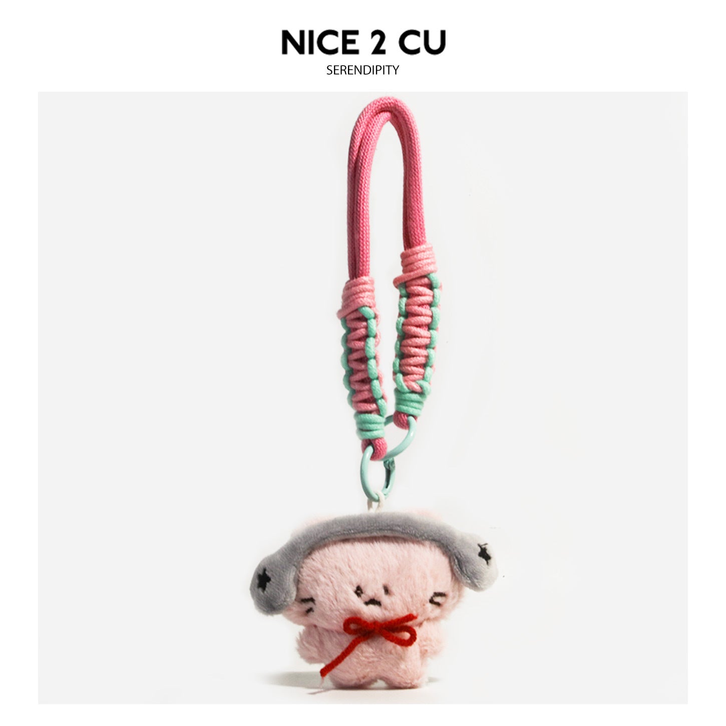 Pink plush cat charm with gray ear covers, red bow, and pink-mint braided cord keychain