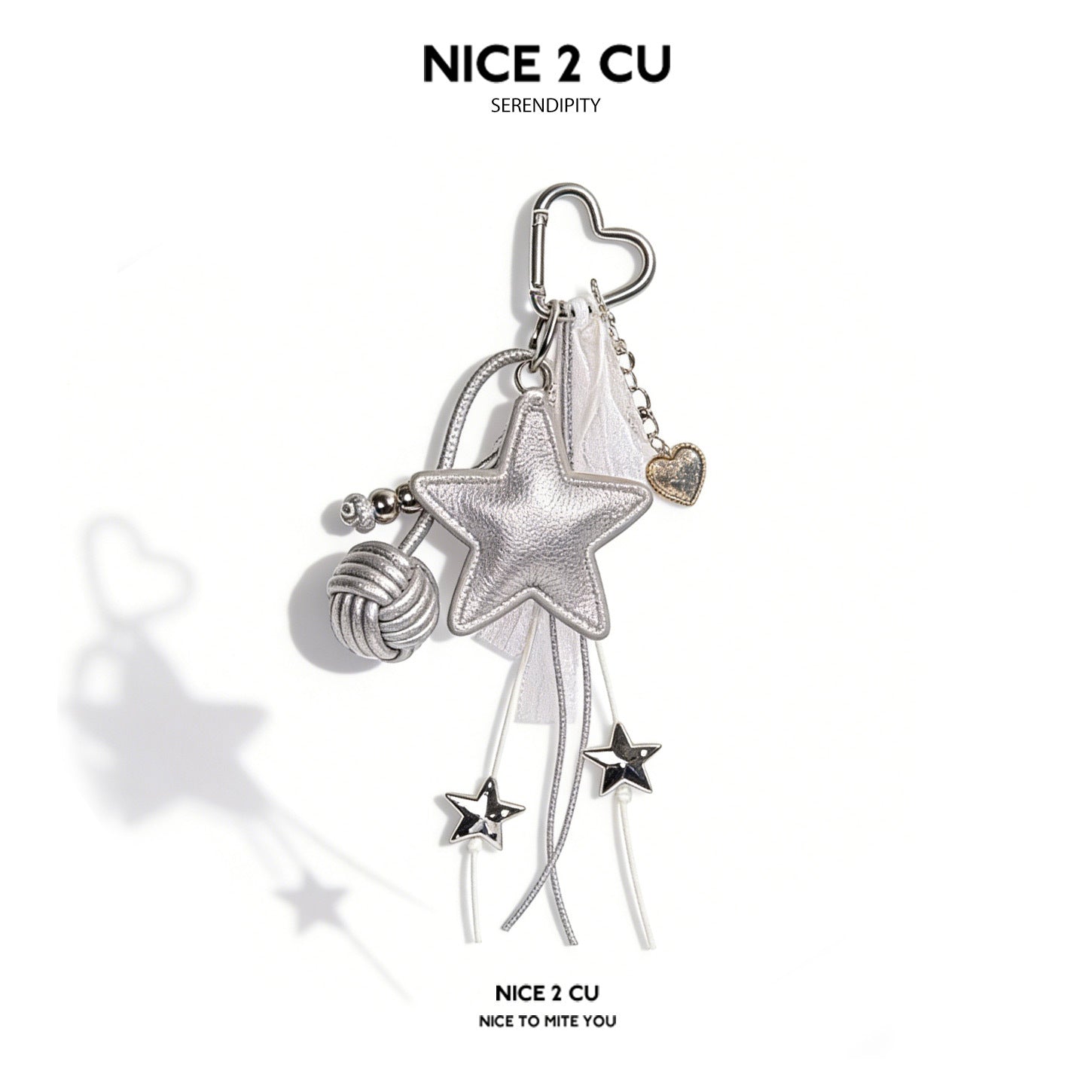 Silver faux-leather five-point star keychain charm with heart carabiner and star bead accents