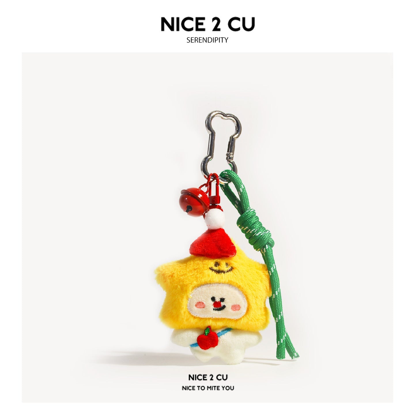 Yellow star-shaped Christmas plush keychain charm with small face, red hat, and green strap