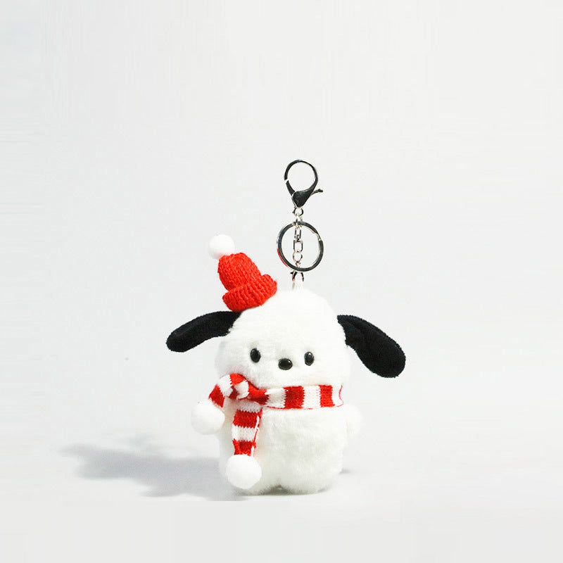 White plush dog keychain charm wearing a red knitted beanie with white pom-pom and red-and-white striped scarf
