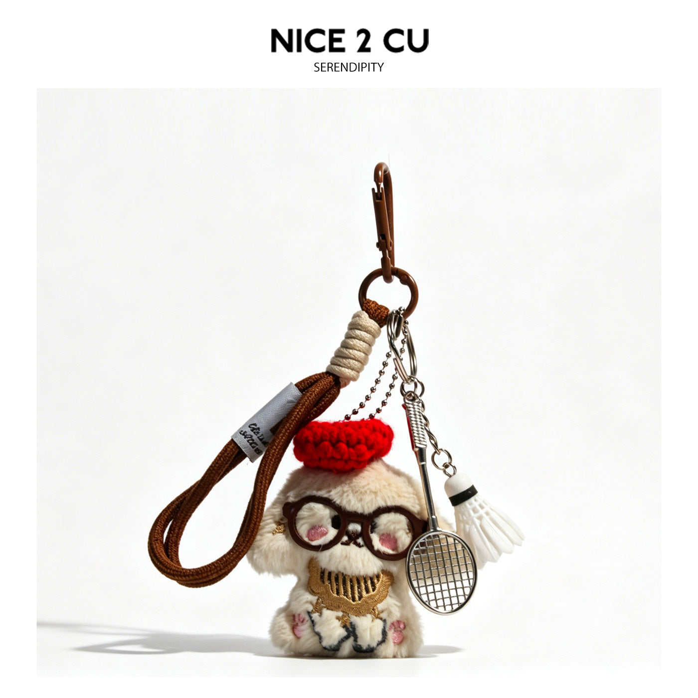 Fluffy brown dog charm with red beret and glasses paired with silver badminton racket and shuttlecock charms
