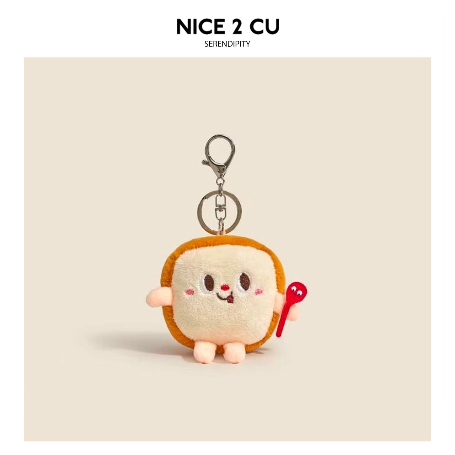 Classic bread-bun plush keychain charm with smiling embroidered face and silver metal clasp