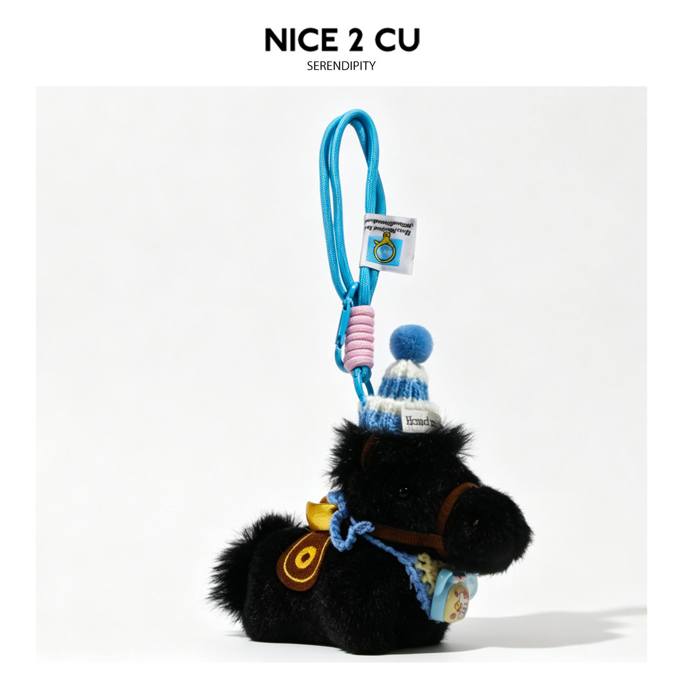 Black plush horse charm with blue striped knit hat, blue pom-pom, and brown bridle and saddle accents