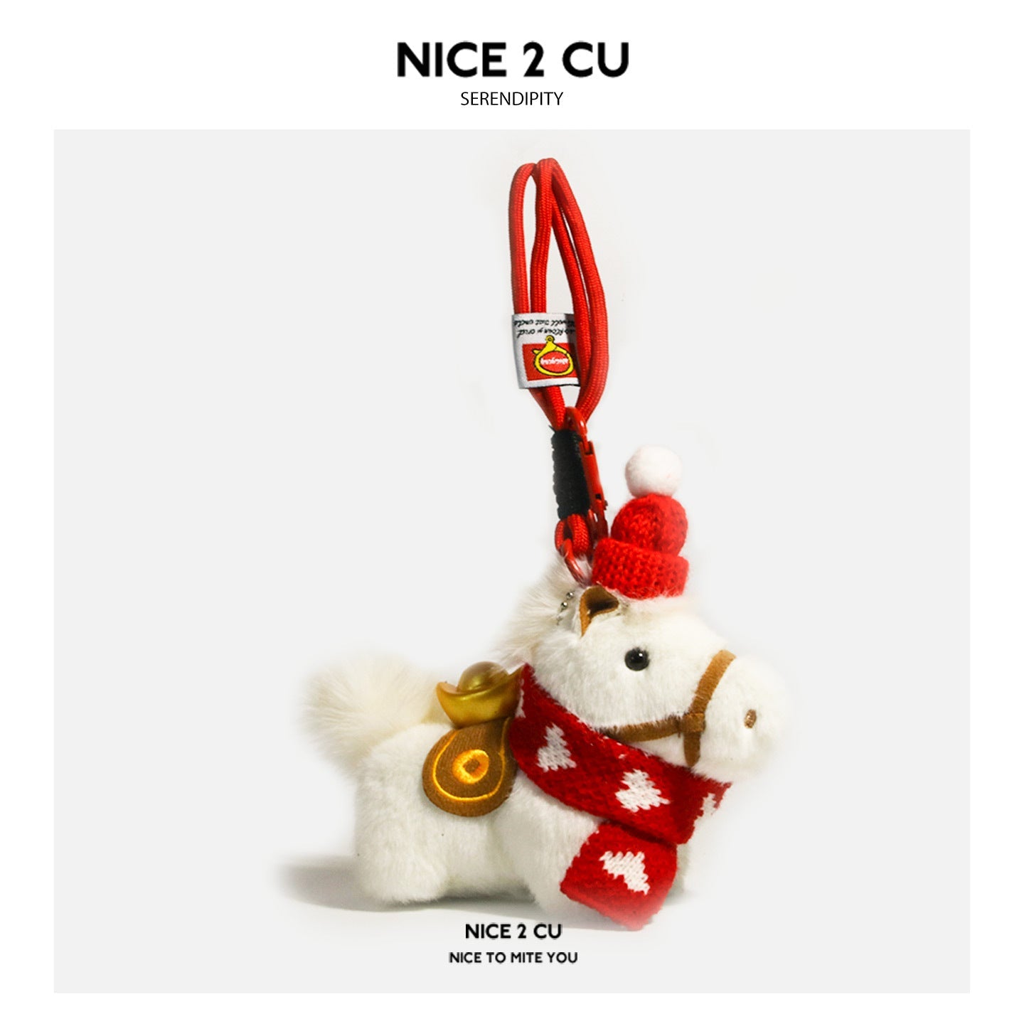 White plush horse ornament with red heart-pattern scarf, red hat, and carabiner hook attachment