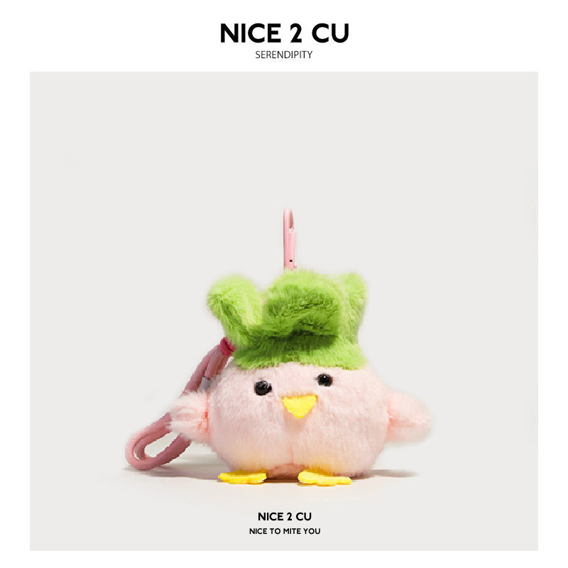 Pink fluffy plush chick keychain charm with green hat and matching pink cord clip attachment