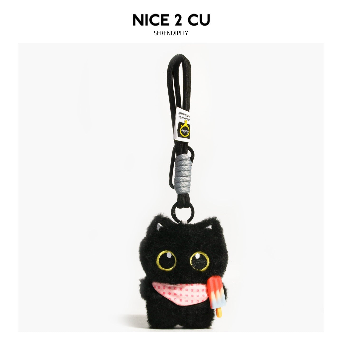 Black cat plush charm with pink patterned bib and popsicle-shaped accessory on carabiner clip