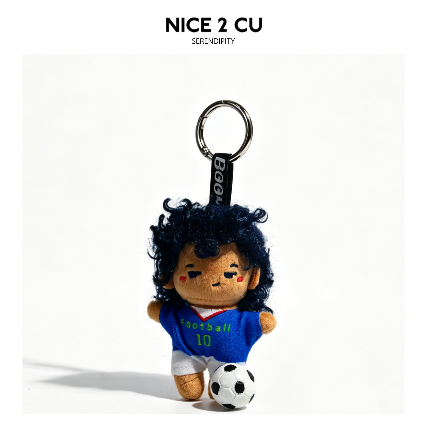 Soft plush soccer kid keychain charm in blue jersey with green lettering and white shorts