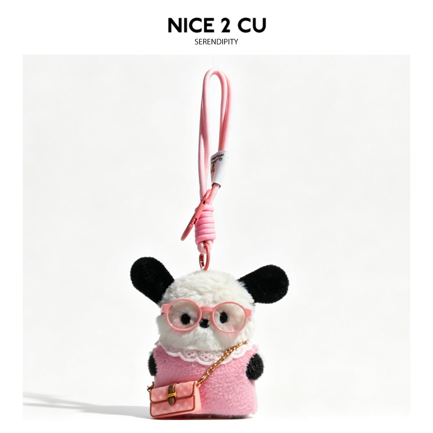 Plush dog bag charm in pink fuzzy outfit with round pink glasses and small pink handbag on pink clip cord