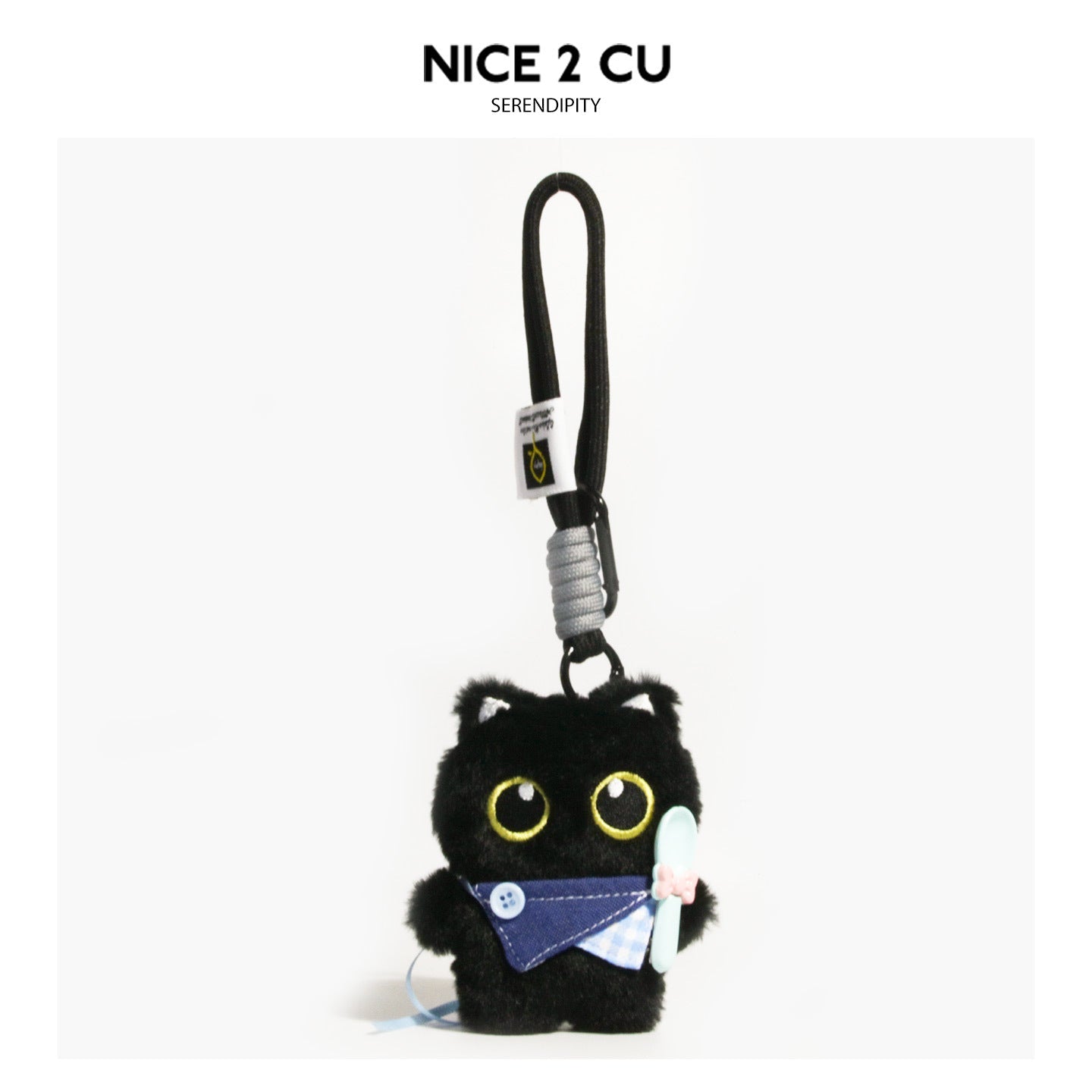 Black cat plush keychain with dark blue layered bib and pale blue spoon accessory