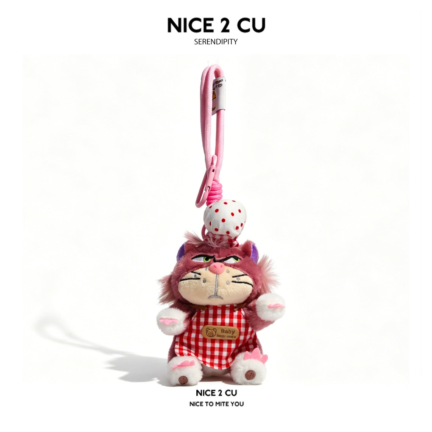 Mauve cat plush keychain dressed in a red gingham outfit with a white polka-dot cap accessory