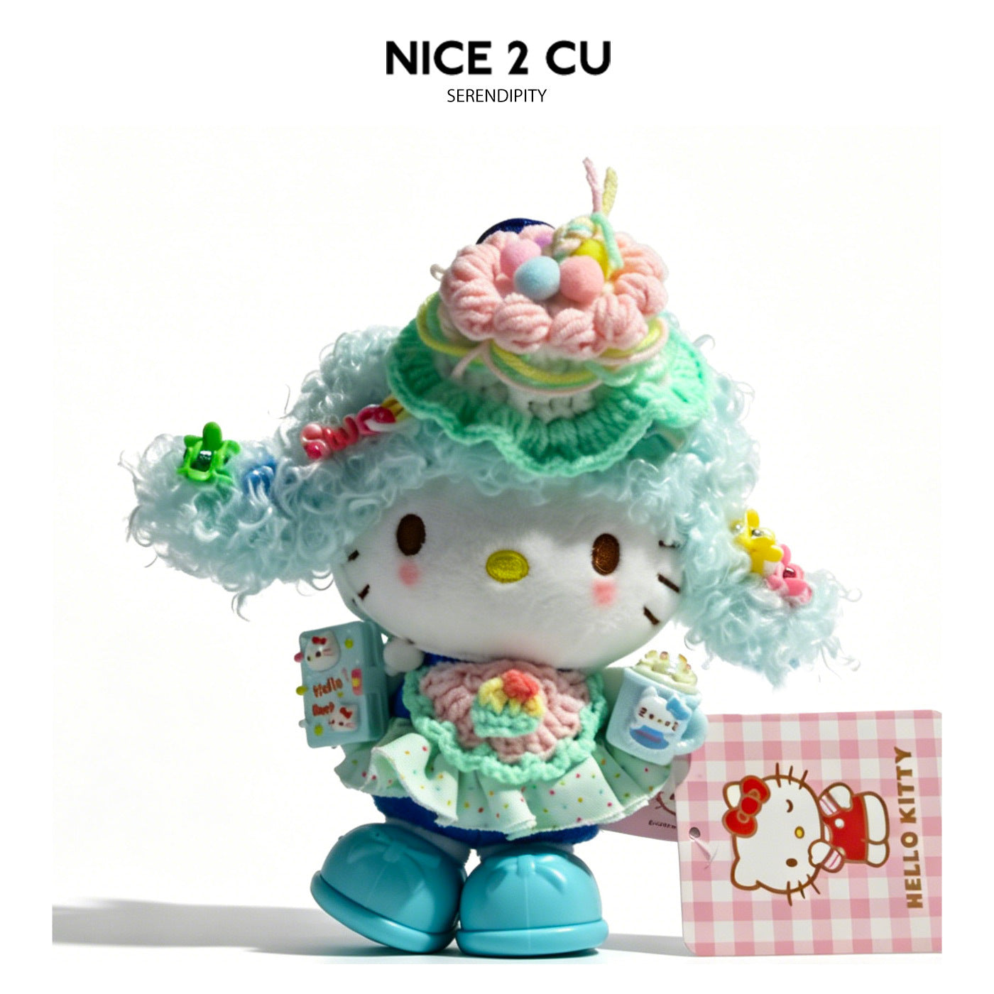 Hello Kitty plush bag charm with light blue curly hair, pastel mint and pink outfit, and blue heart carabiner clip