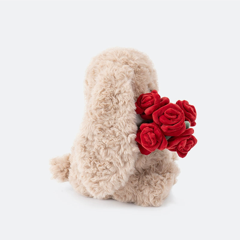 The ZEIO Rose-Holding Bunny Plush Toy (29cm) is a soft rabbit doll holding a red rose bouquet—an adorable addition to any nursery décor.