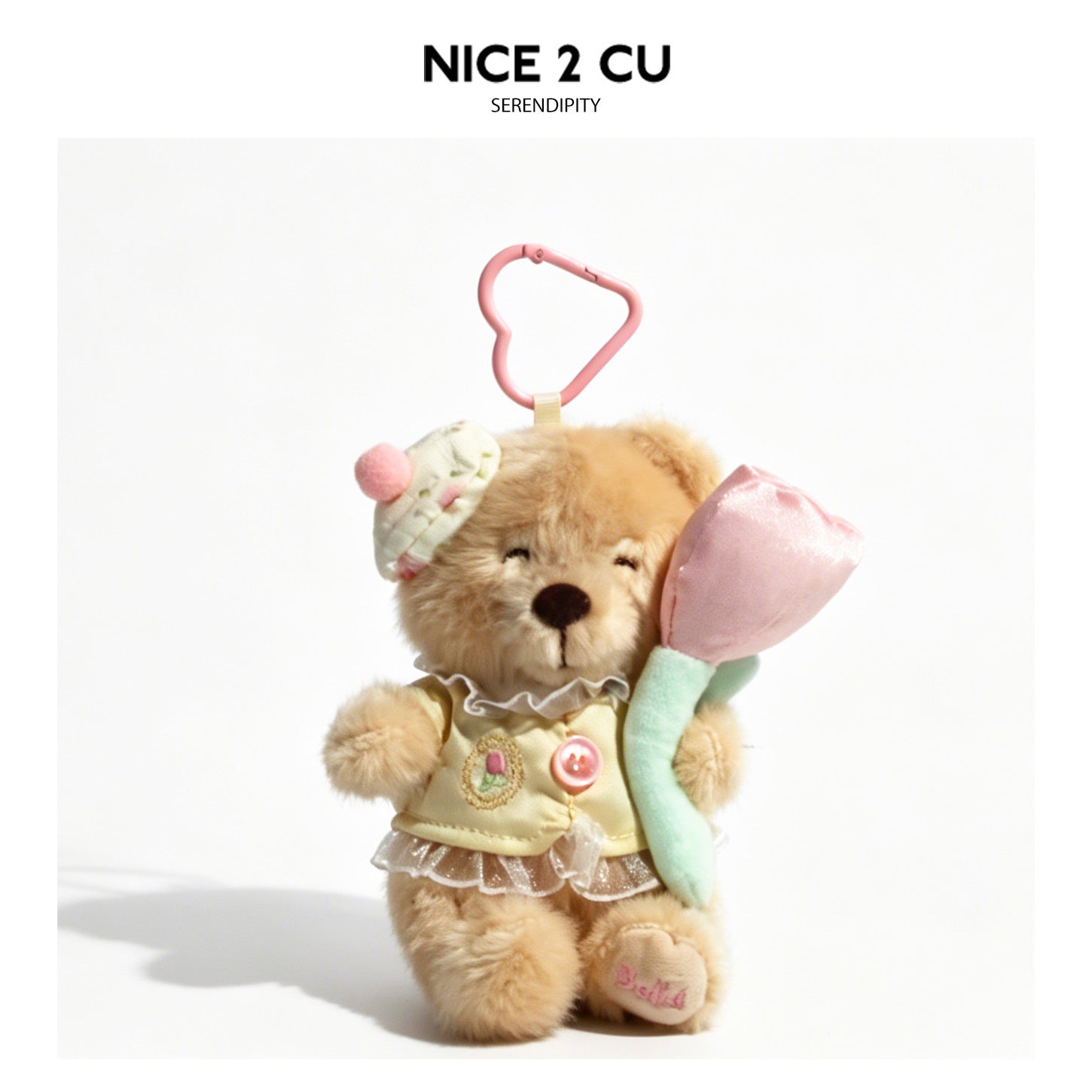 Plush teddy bear charm holding a long-stem tulip flower with mint-green stem, attached to a blue clip chain