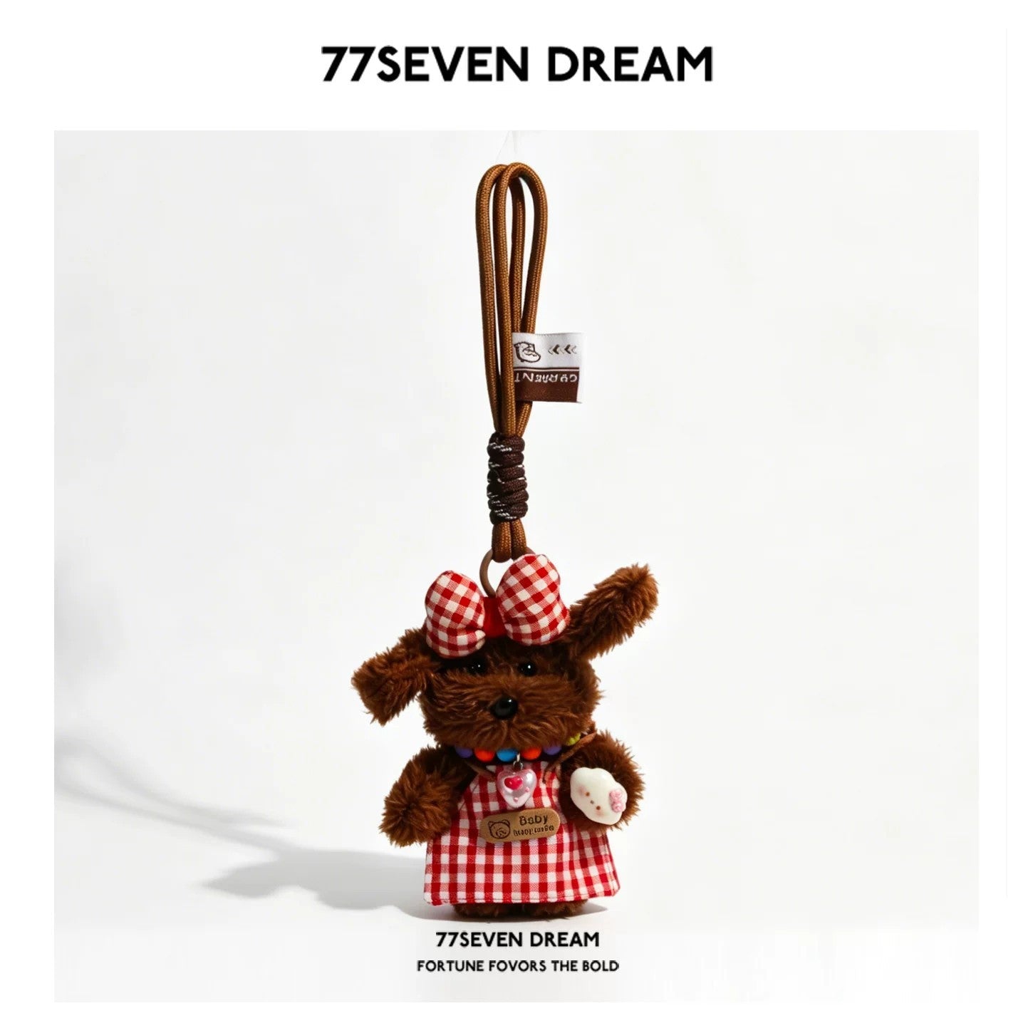 Dark brown plush puppy charm in red gingham dress with matching bow and brown hanging cord