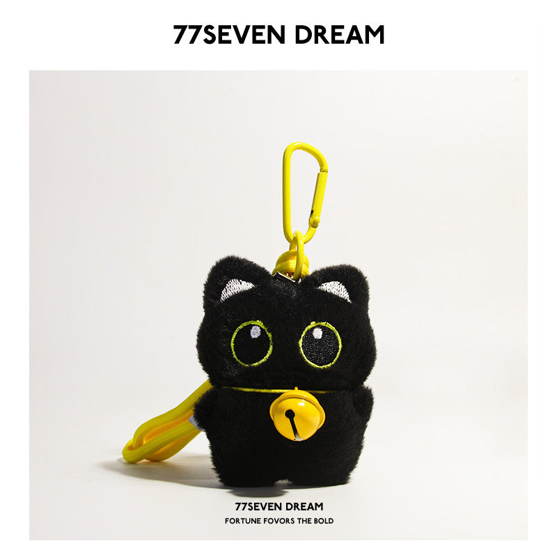 Black cat plush keychain charm with green-outlined eyes and yellow jingle bell, yellow carabiner clip