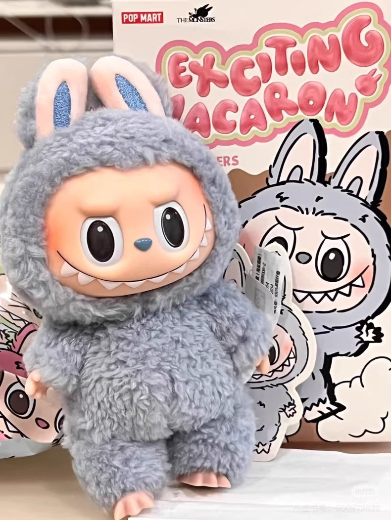 The Labubu “Sea Salt Coconut” Plush Keychain by POP MART features a standing bunny in blue sherpa, perfect for fans of The Monsters and kawaii collectibles. Comes in a matching Exciting Macaron toy box.