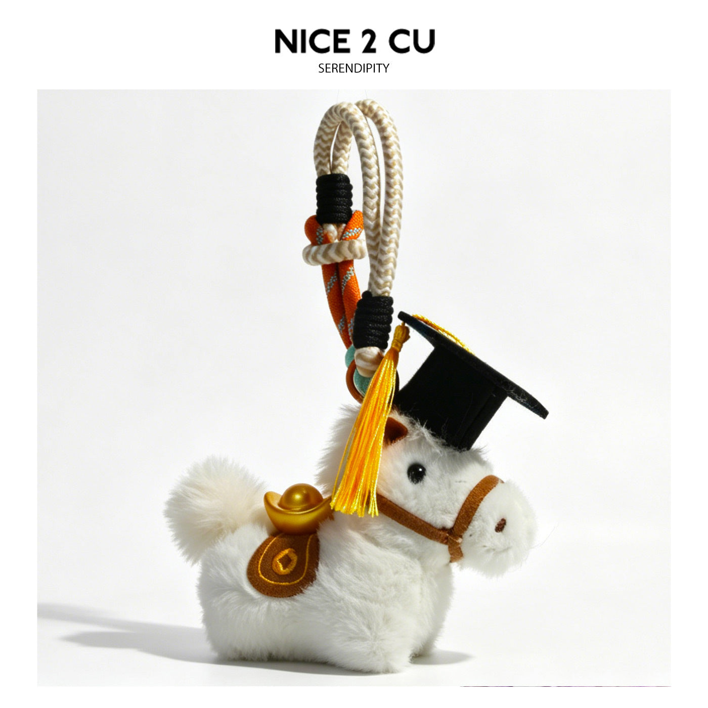 White plush horse charm with black graduation cap, gold saddle accent, and orange-accented braided hanging rope