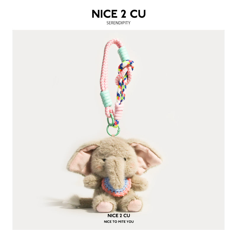 Beige plush elephant charm with blue-and-pink crocheted bib and braided mint-green wrist strap