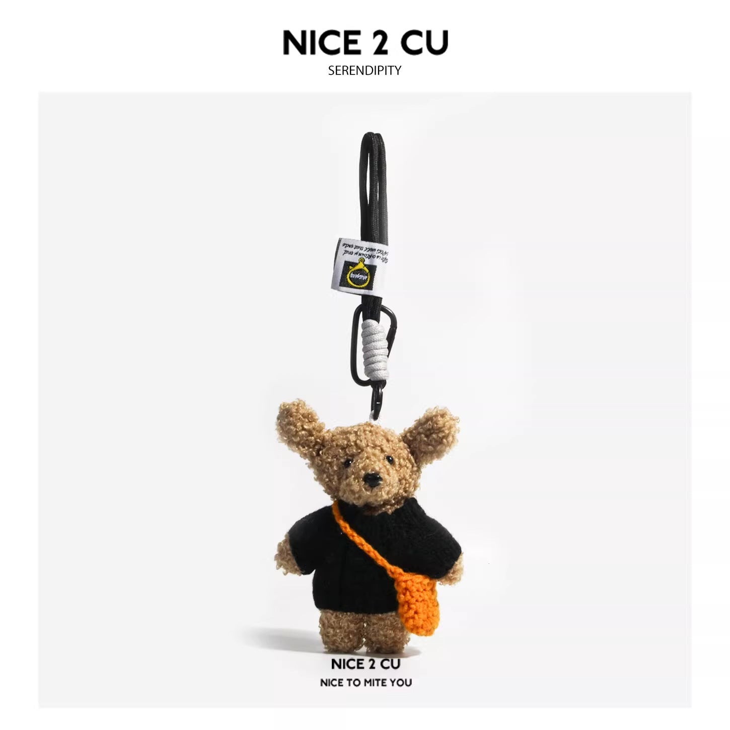 Curly plush teddy bear keychain charm wearing a black knitted sweater and small orange crocheted crossbody bag with carabiner