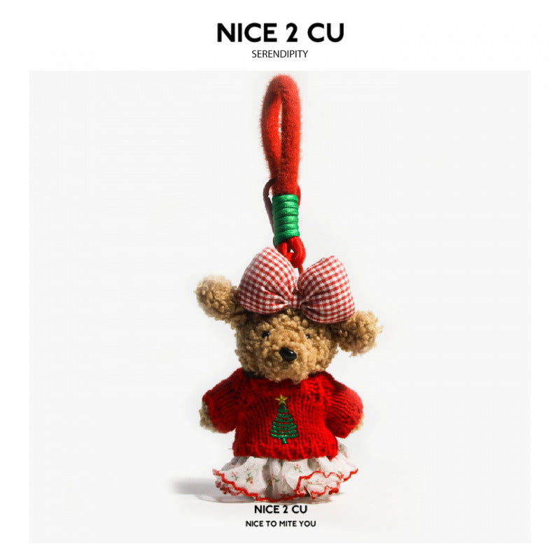 Brown plush bear charm in red Christmas tree knit sweater and white ruffled skirt with red gingham bow and red loop strap