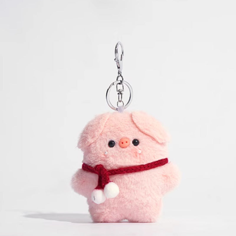 Pink plush pig keychain with red scarf and white pom-poms, no glasses, silver keychain hardware