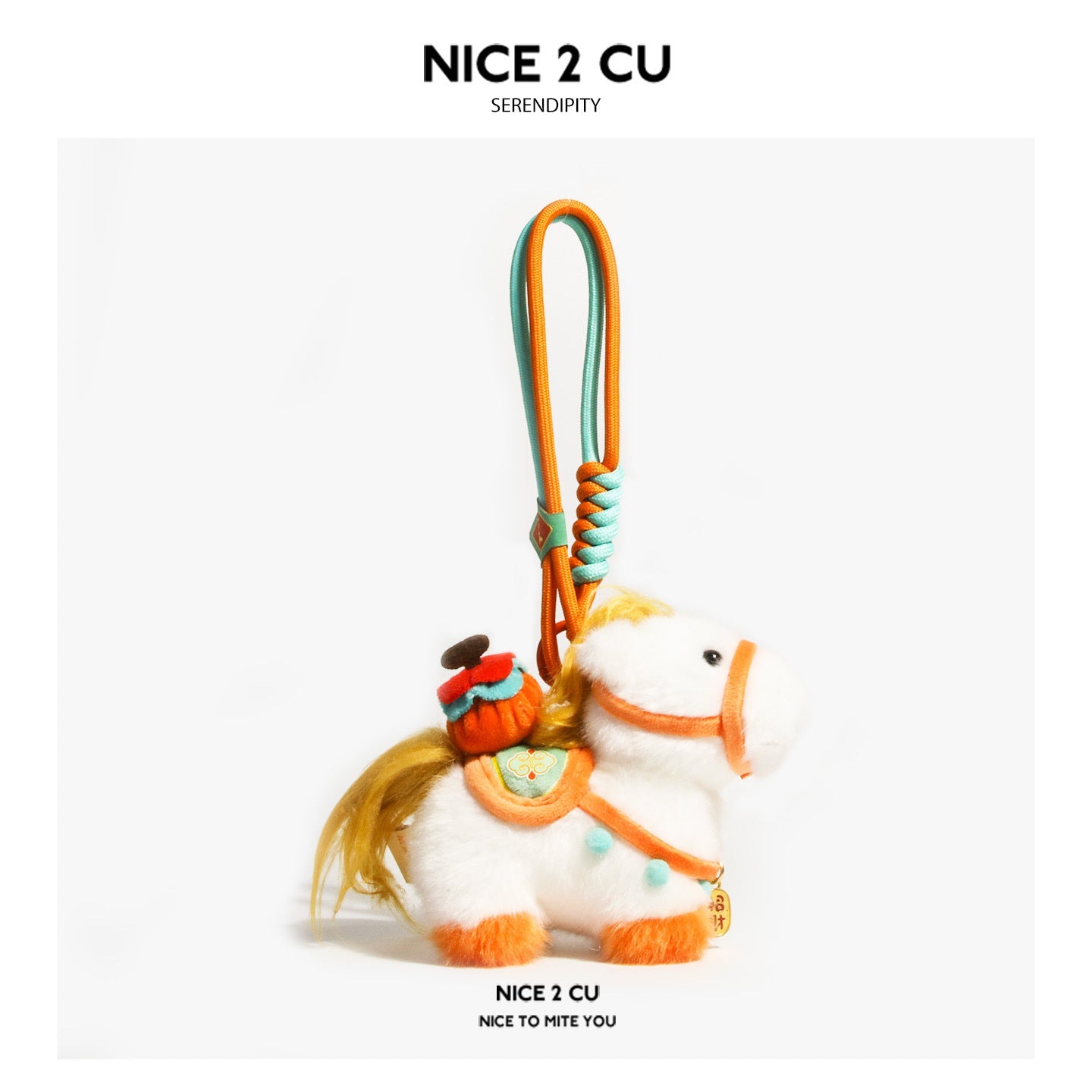 Orange-themed white plush pony charm with orange and mint-green tack and a matching braided hanging loop