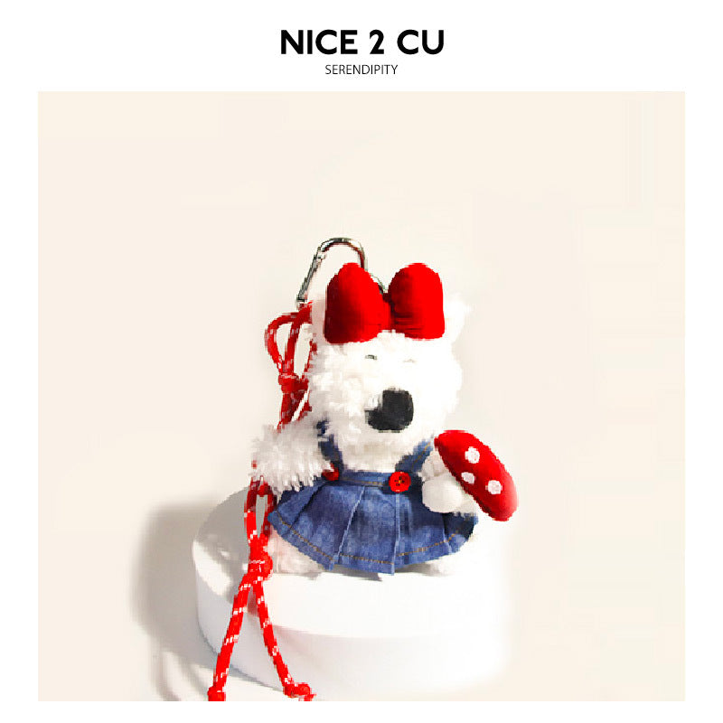 White terrier plush bag charm with red bow, denim skirt, polka-dot mushroom, and heart-shaped metal clip