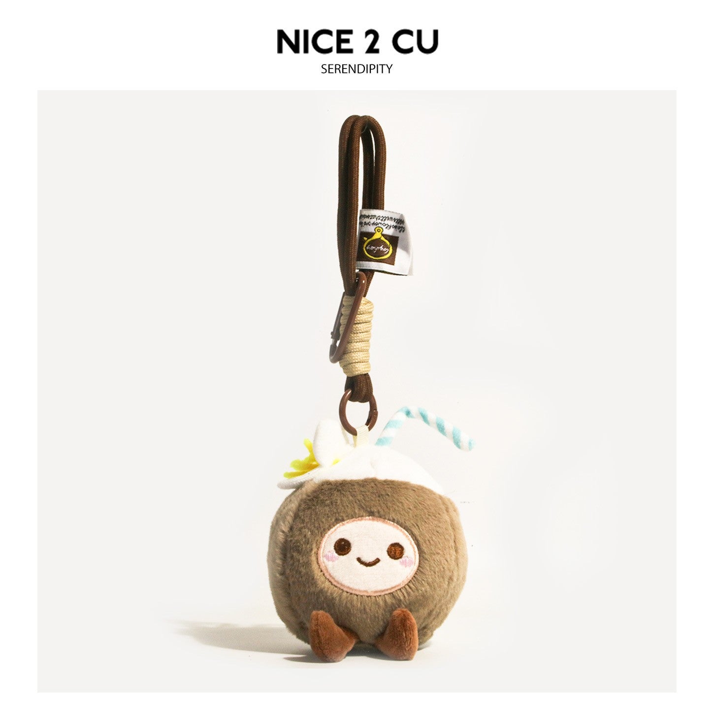 Brown kawaii coconut plush keychain charm with embroidered face, striped straw, and hanging clip strap