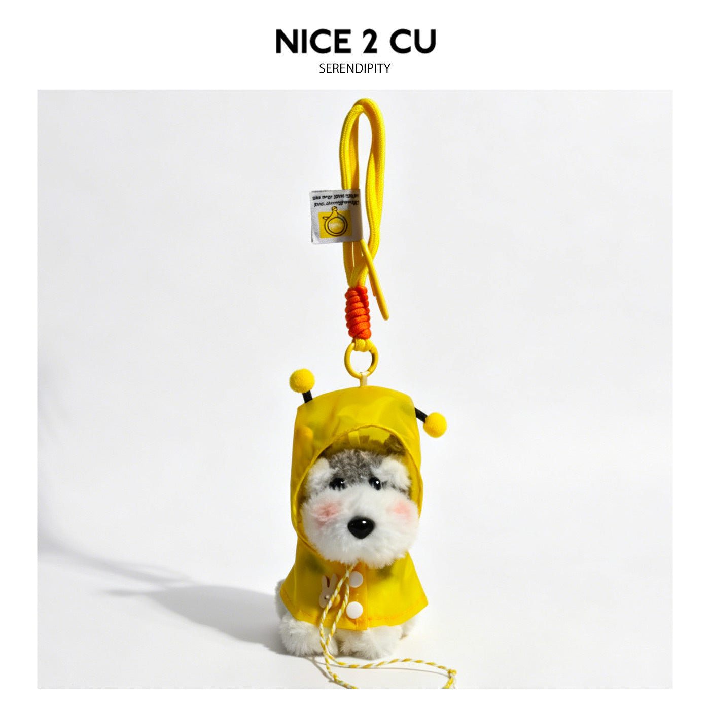 Schnauzer plush keychain in a yellow hooded raincoat with pom-pom ear decorations and yellow braided strap