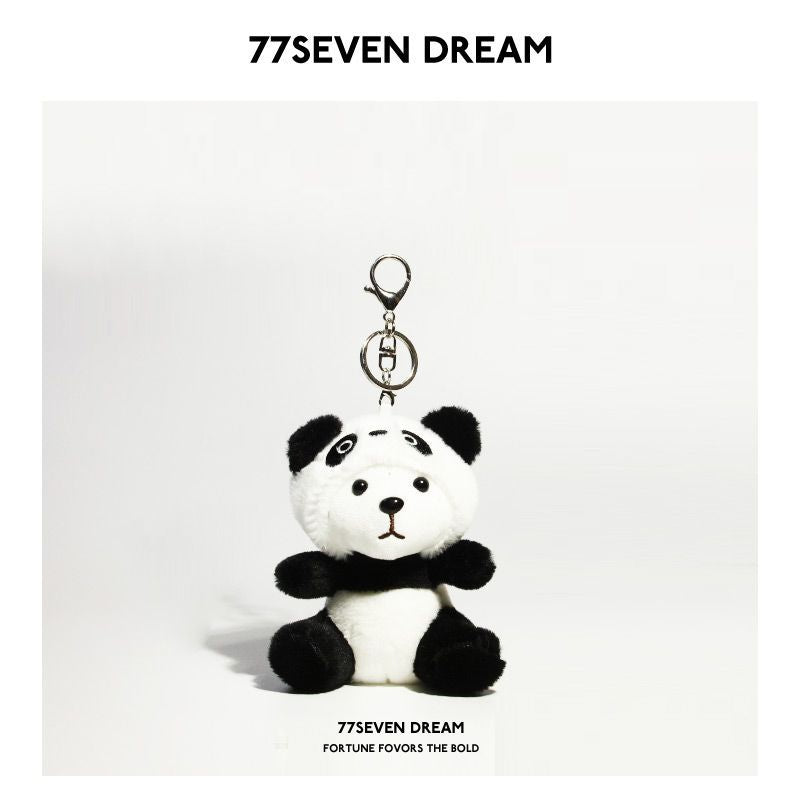 Black and white panda-style plush bear keychain charm with white face and metal clasp