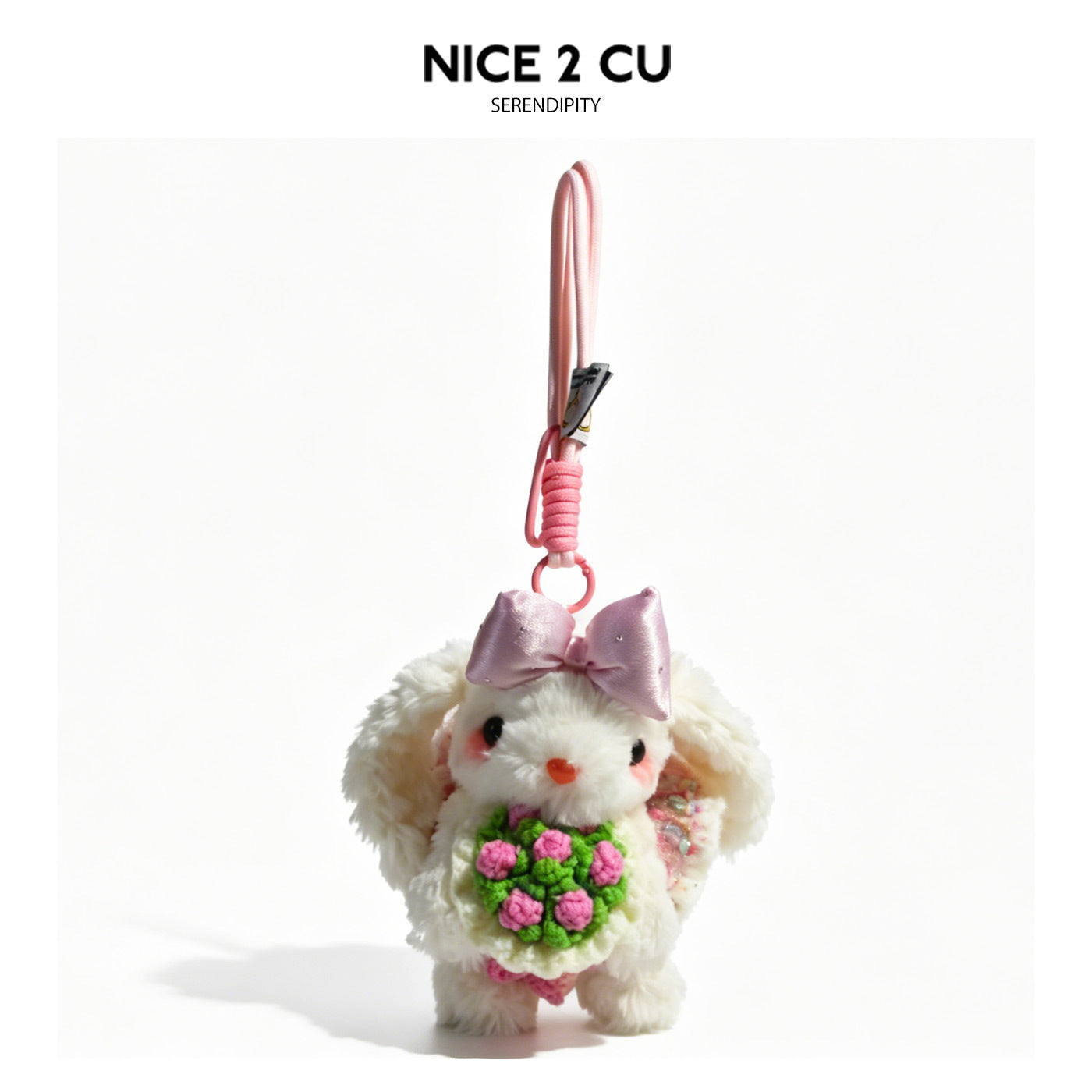 White bunny plush bag charm with pink bow, pink loop cord, and pink-and-green crochet bouquet