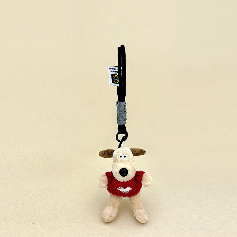 Short-fur cream dog plush charm wearing red knitted sweater with white heart motif