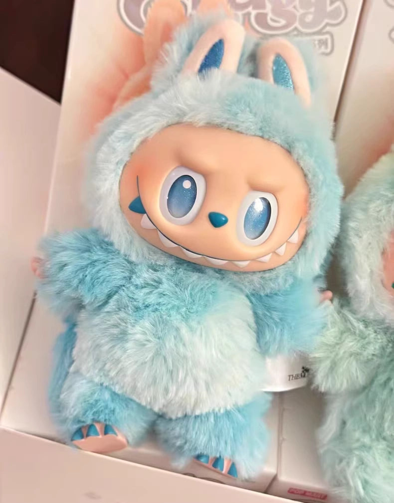 The Labubu “Hope” Plush Keychain from POP MART’s The Monsters “Big Into Energy” series is a sky-blue bunny bag charm—a collectible with pointed teeth, big blue eyes, and stand-out white-and-blue fur.