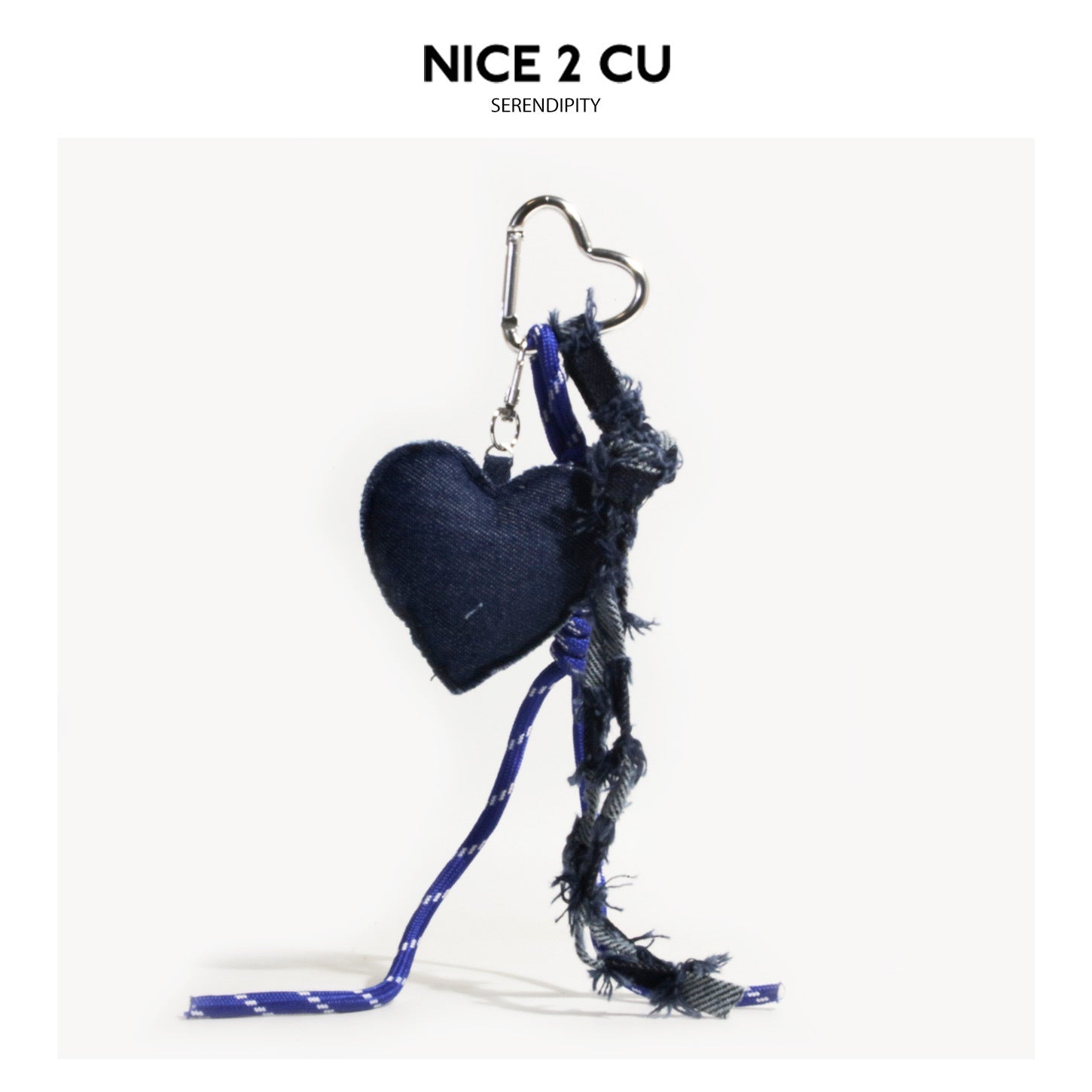 Dark navy stuffed denim heart charm keychain with frayed edges and heart-shaped silver carabiner clip