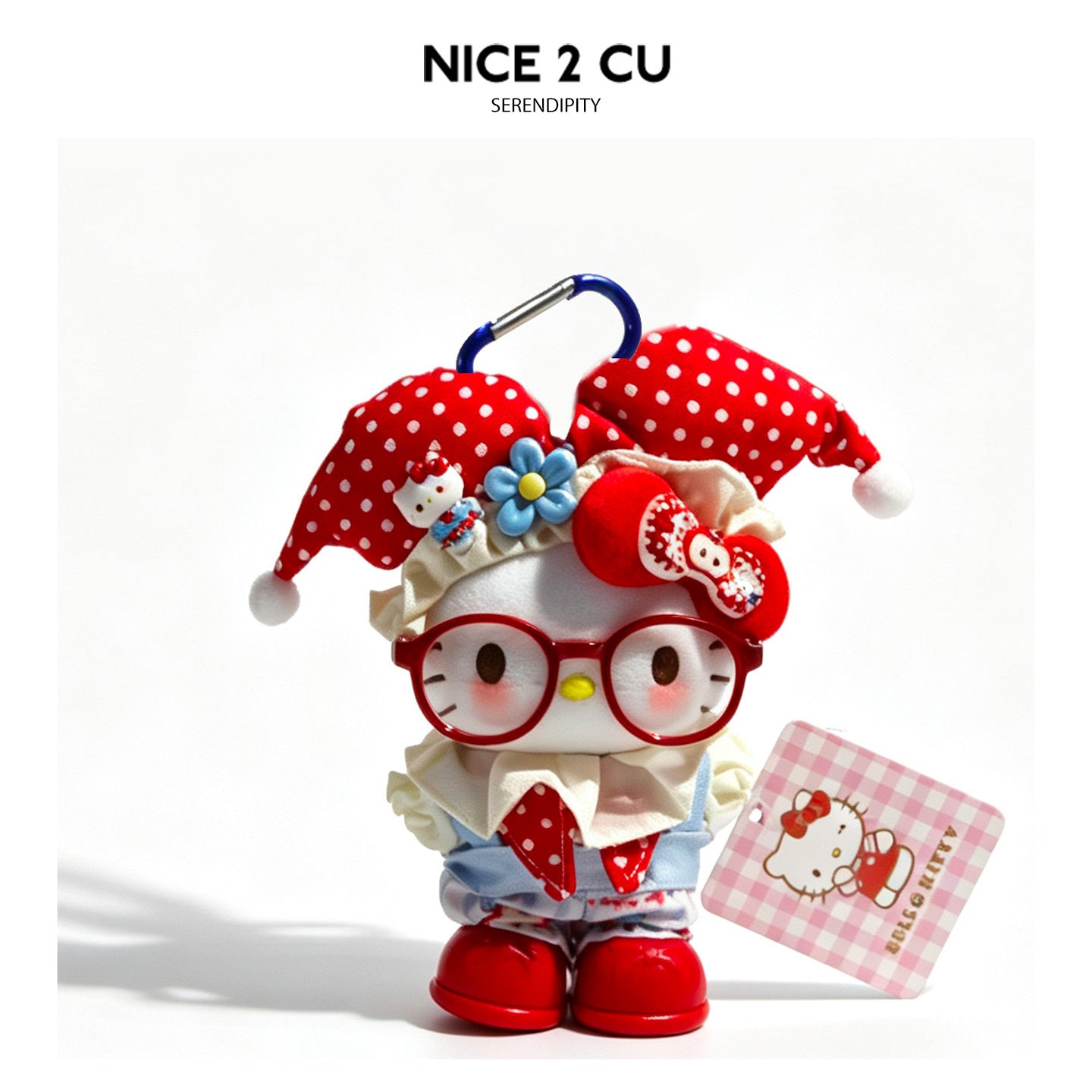 Red polka-dot jester cat character figure charm with ruffled collar, round glasses, and blue carabiner clip