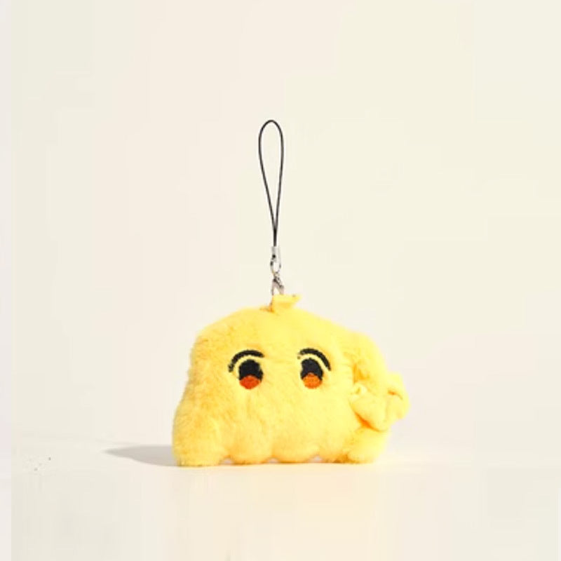 Yellow chibi plush keychain with embroidered facial features and black loop strap on light background
