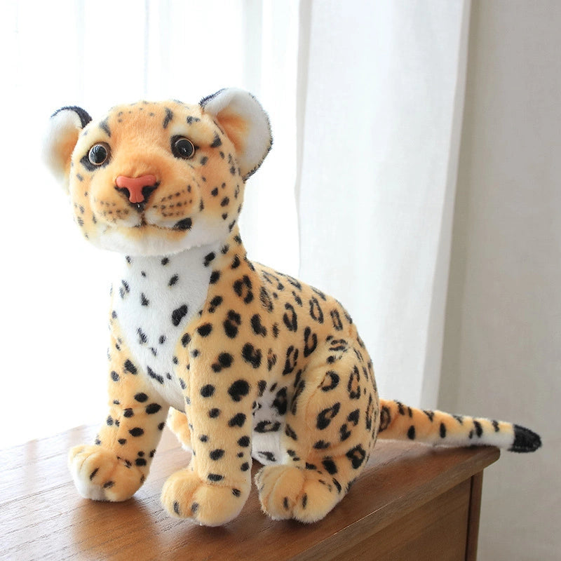 The ZoDoll Cheetah Plush Animal Stuffed Toy, available in 23cm, 27cm, and 33cm sizes, features soft, realistic spotted fur—making this plush cheetah doll a charming addition to any room.