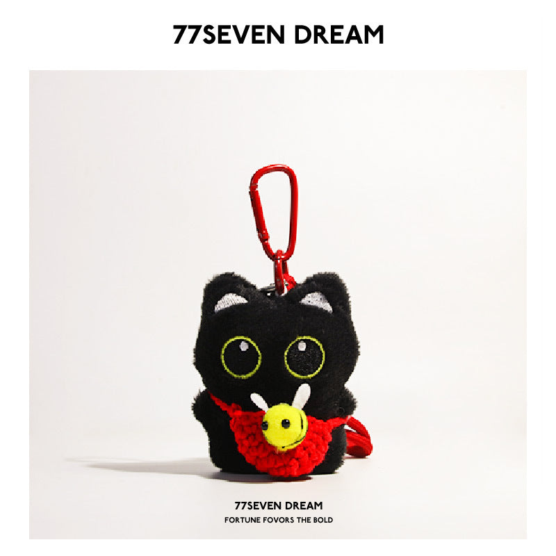 Black cat plush charm with red crocheted bee-front panel and small yellow bee motif, red carabiner
